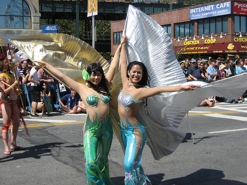 Rollerblading mermaids at the Coney Island Mermaid Parade, courtesy of Sameb.